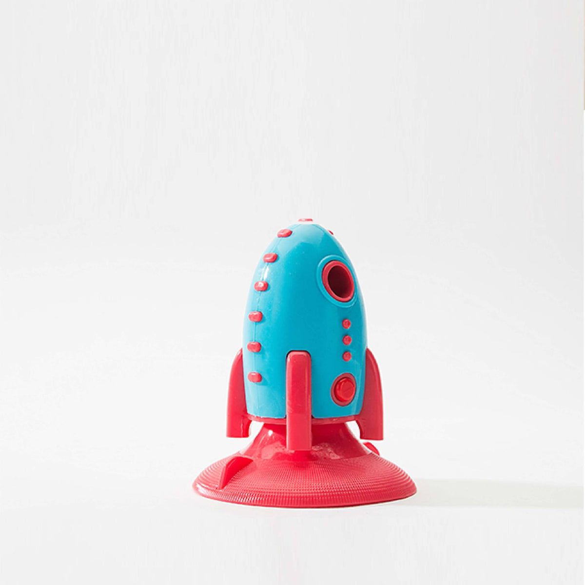 Rocket-shaped dog chew and treat toy