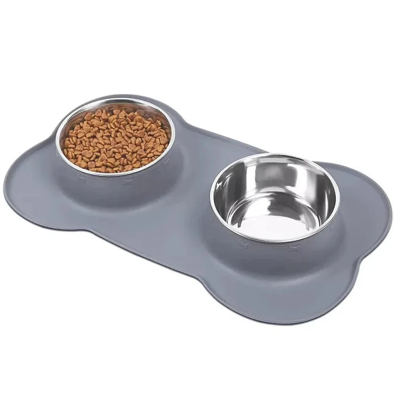 Grey silicone mat with two stainless steel pet feeding bowls