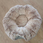 Brown plush cat tunnel with padded resting mat