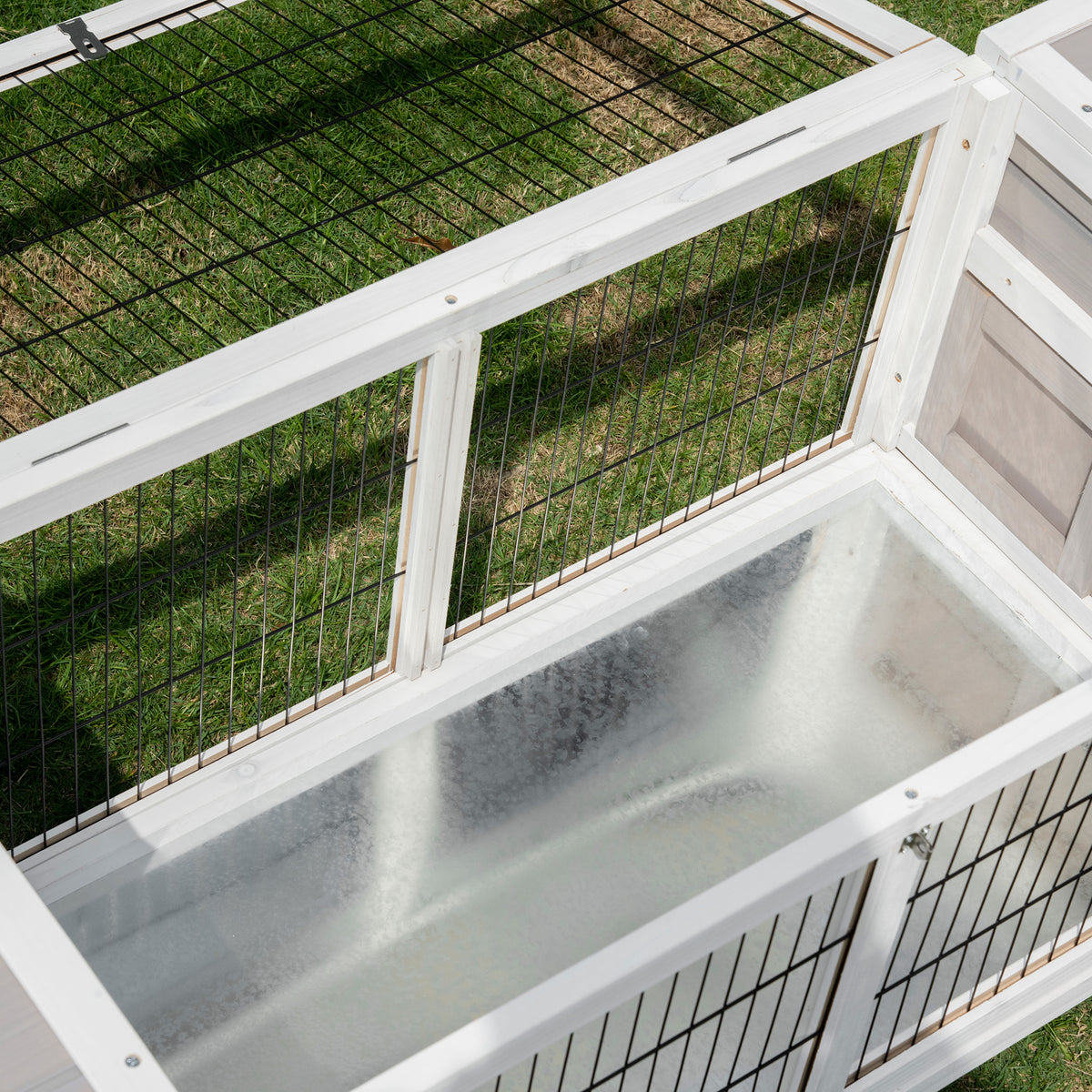 Grey rabbit hutch and run – image 1